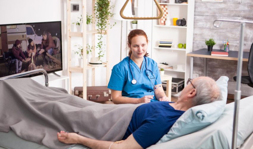 ICU at Home - Professional nurse providing critical care to elderly patient at home in Trivandrum